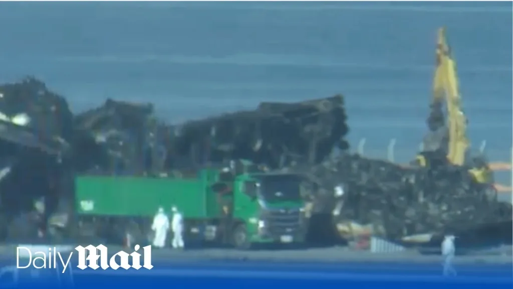 LIVE: Japan aircraft wreckage to be removed following airport collision